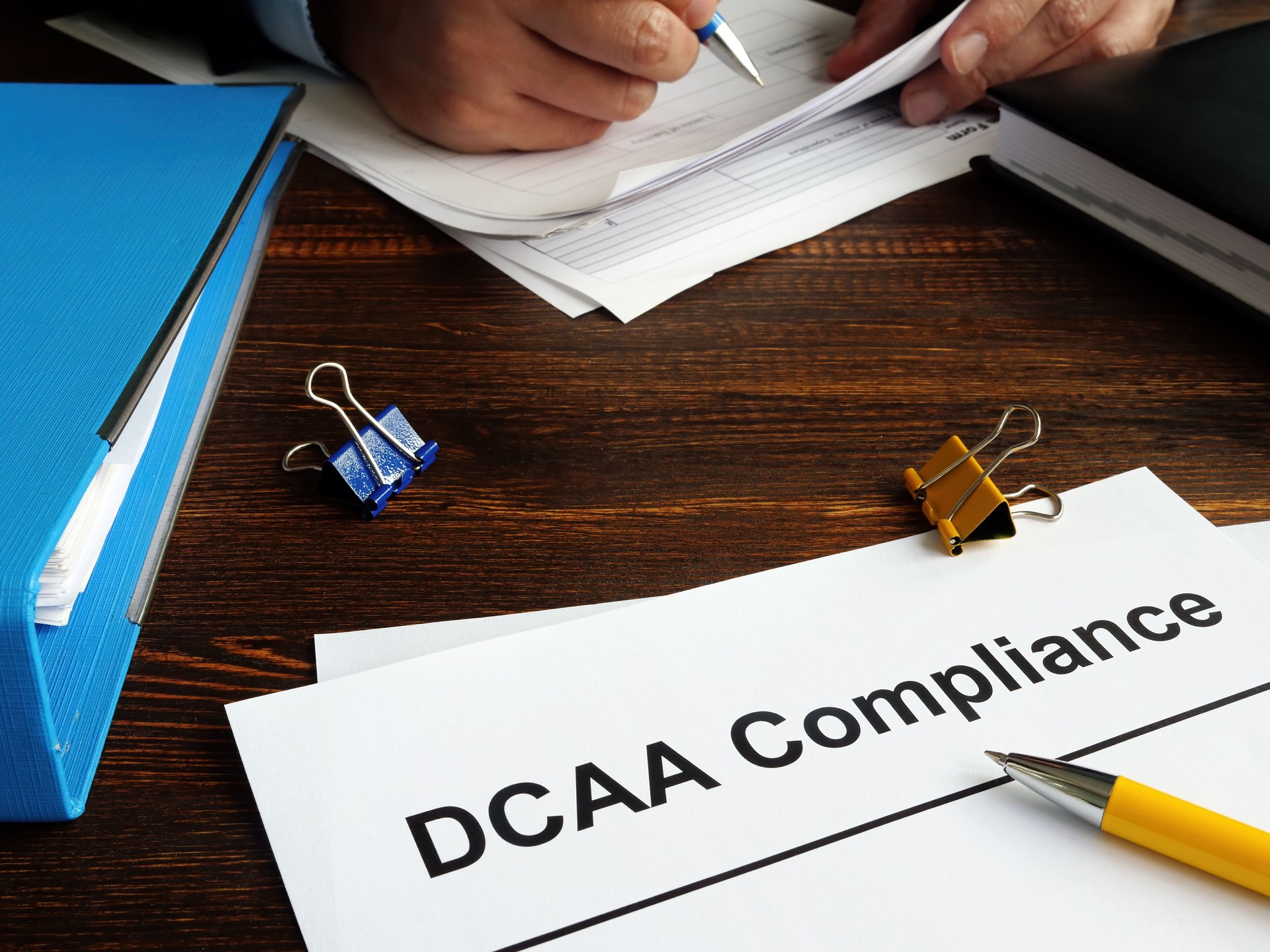 Defense Contract Audit Agency DCAA compliance and working man.